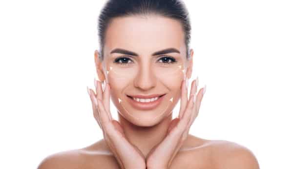 Smiling Woman With Lifting Arrows On Face Concept Of Skin Lifting Picture Id1139925115