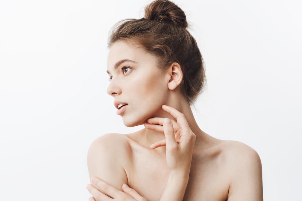 Woman with youthful, contoured jawline from Renuva volumizing injectable.